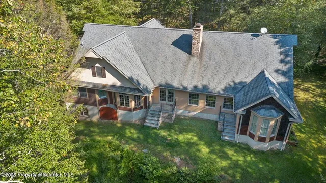 a front view of house with yard