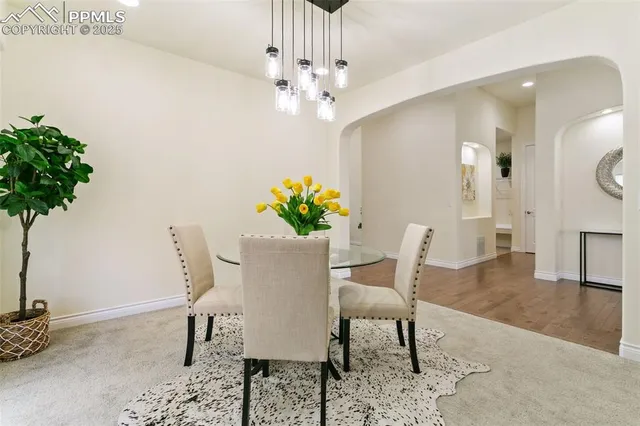 a spacious bedroom with a bed and a couch