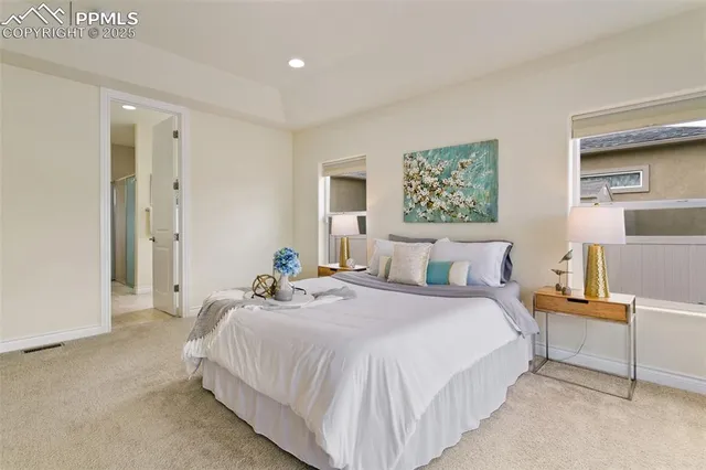 a view of a big room with entryway table and chairs