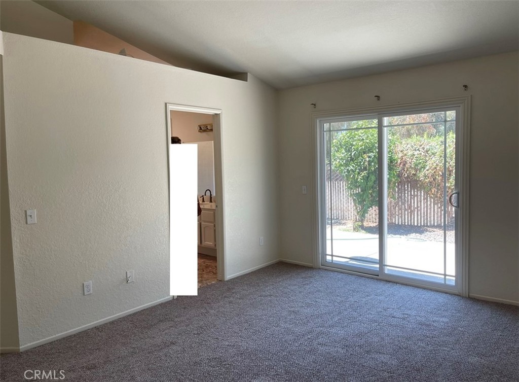 1341 Grovehill Drive Riverside, CA 92507 - Photo 4 of 23 a view of an empty room with a window