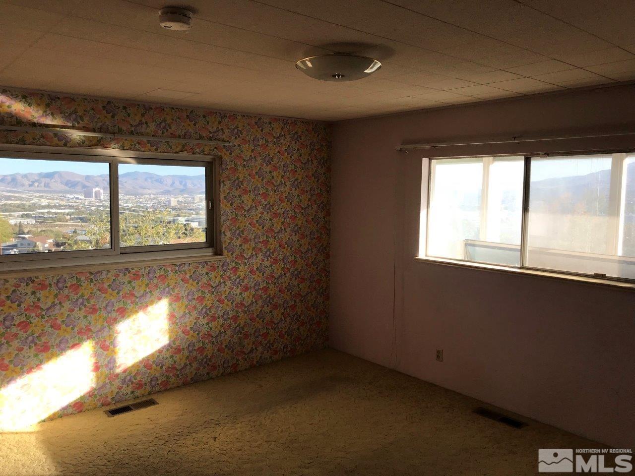 30 Greenstone Circle Reno, NV 89512 - Photo 16 of 34 a view of an empty room with a window