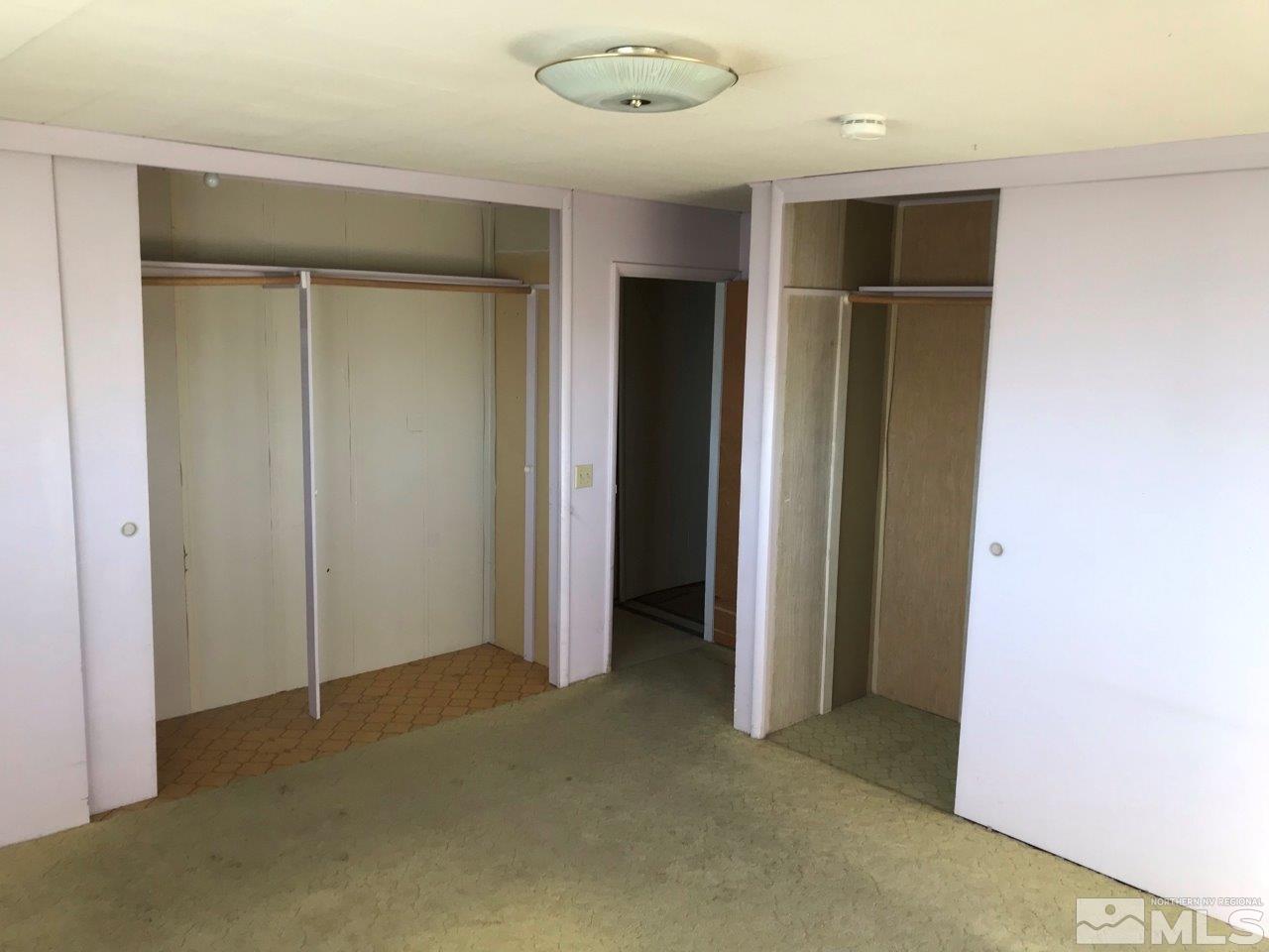 30 Greenstone Circle Reno, NV 89512 - Photo 17 of 34 an empty room with closet and a bathroom