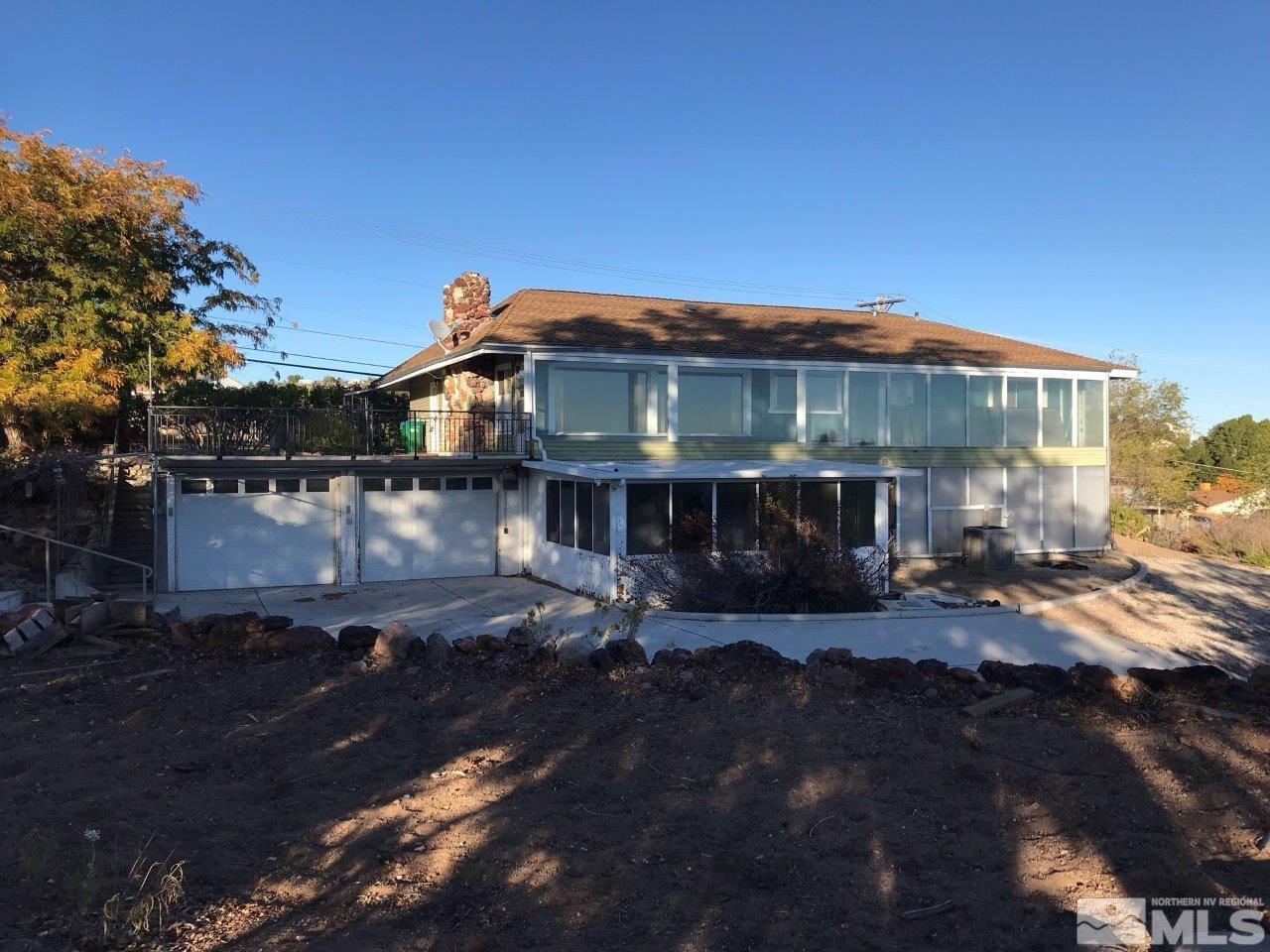 30 Greenstone Circle Reno, NV 89512 - Photo 5 of 34 a view of a house with a yard