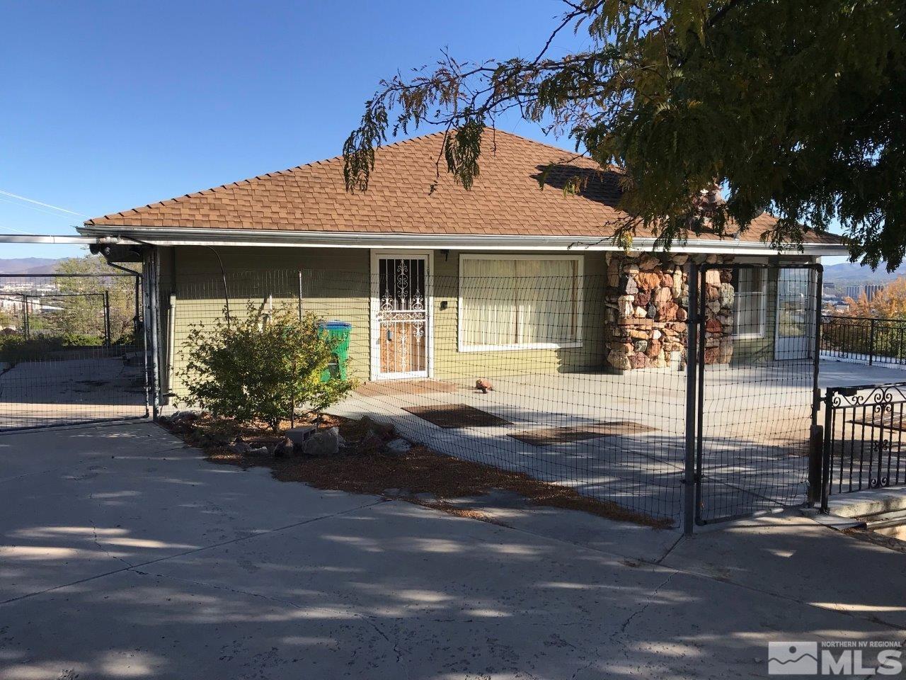 30 Greenstone Circle Reno, NV 89512 - Photo 6 of 34 a front view of a house with porch