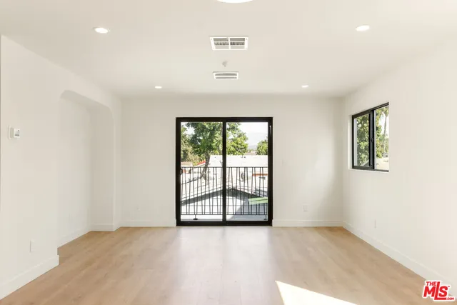 an empty room with windows