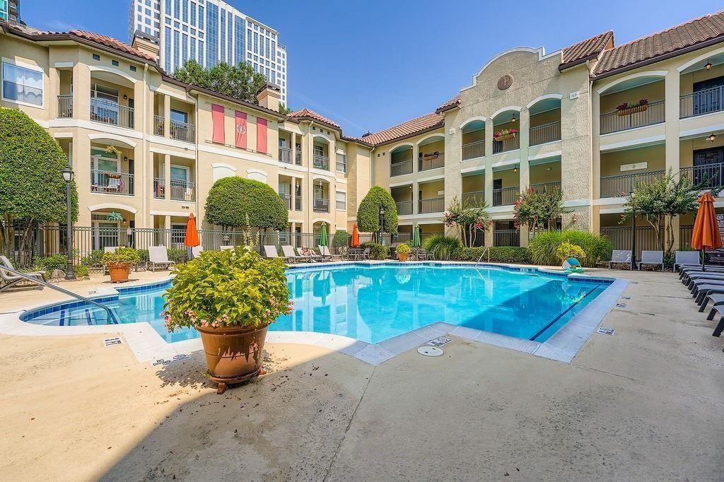 955 Juniper Street Northeast, Unit 4127 Atlanta, GA 30309 - Photo 20 of 29 a view of a building with potted plants