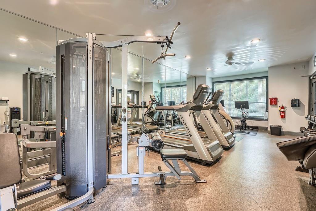 955 Juniper Street Northeast, Unit 4127 Atlanta, GA 30309 - Photo 23 of 29 a view of a room with gym equipment