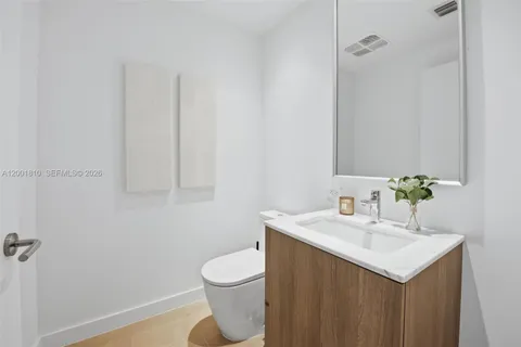 a bathroom with a sink and a toilet