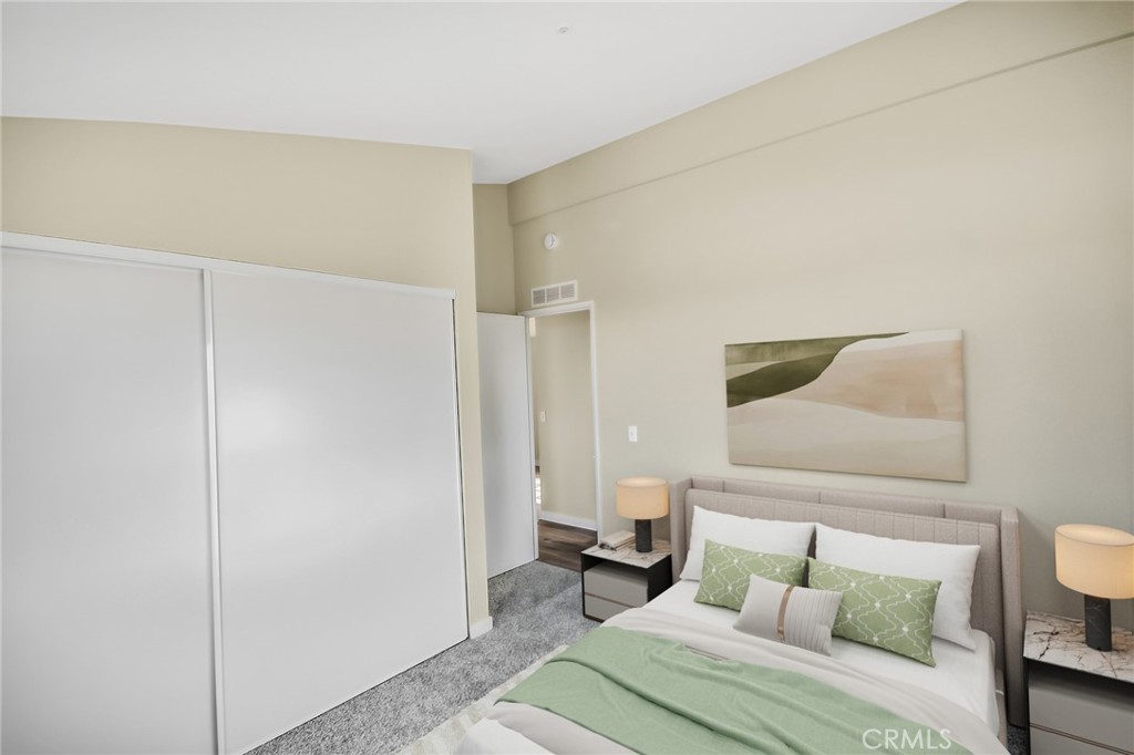 7773 Sequoia Road Phelan, CA 92371 - Photo 11 of 32 a bedroom with a bed and a night stand