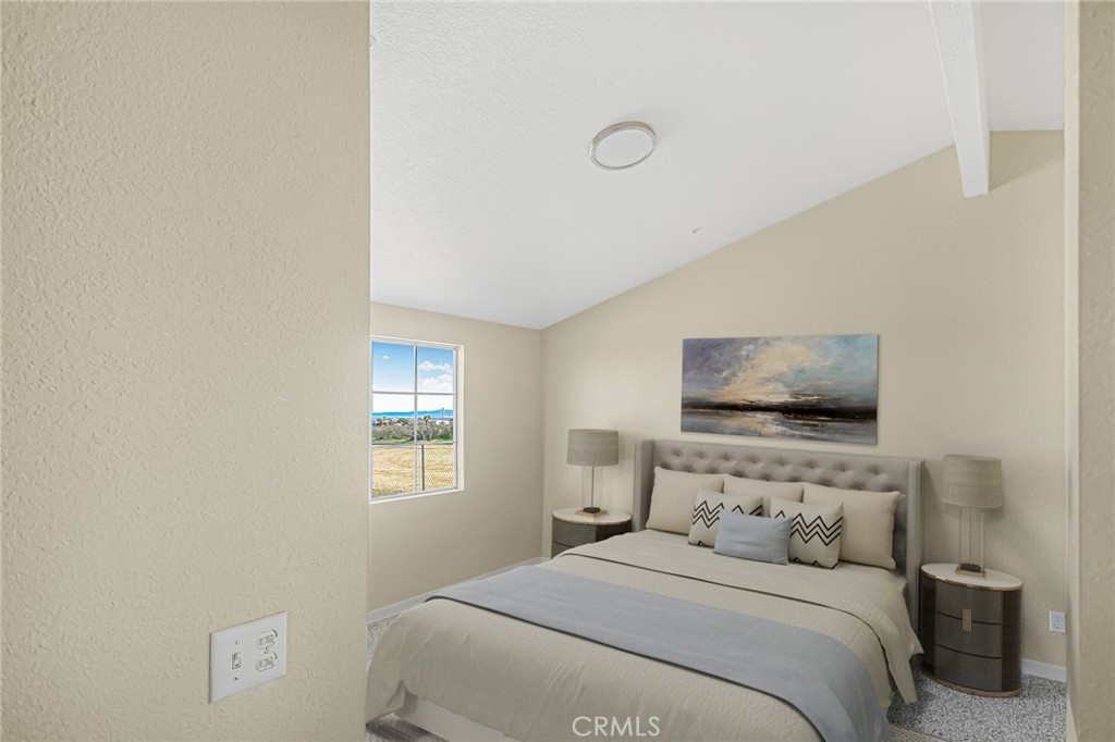 7773 Sequoia Road Phelan, CA 92371 - Photo 16 of 32 a bedroom with a bed and a television