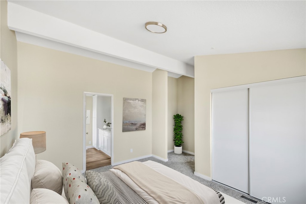 7773 Sequoia Road Phelan, CA 92371 - Photo 19 of 32 a bedroom with a bed and a window