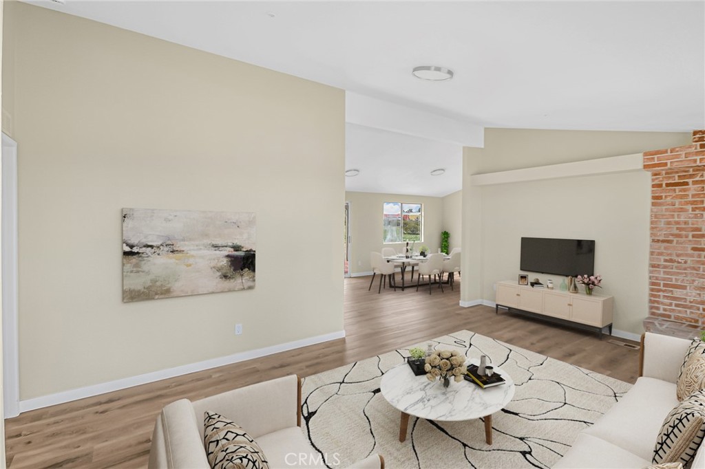 7773 Sequoia Road Phelan, CA 92371 - Photo 3 of 32 a living room with furniture and a flat screen tv