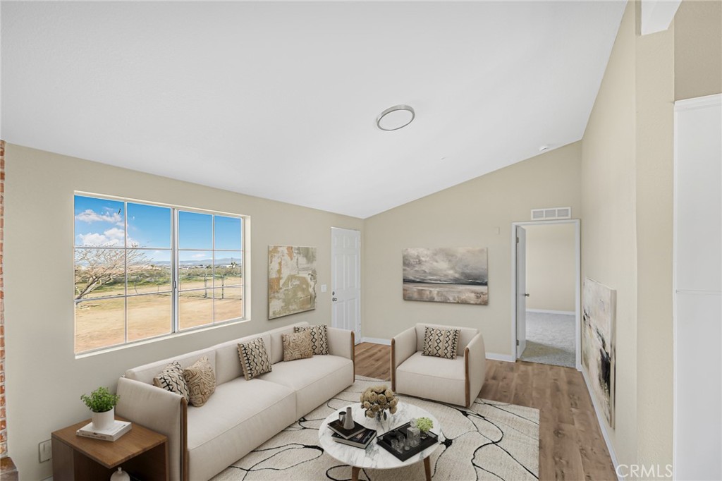 7773 Sequoia Road Phelan, CA 92371 - Photo 4 of 32 a living room with furniture and a window