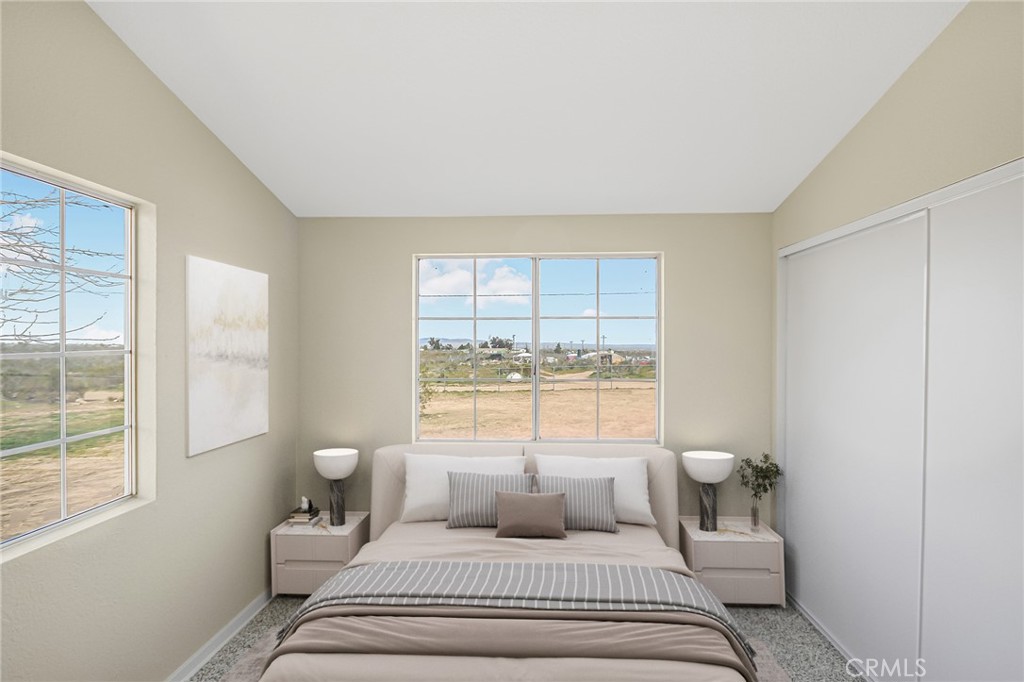 7773 Sequoia Road Phelan, CA 92371 - Photo 10 of 32 a bedroom with a bed and a window