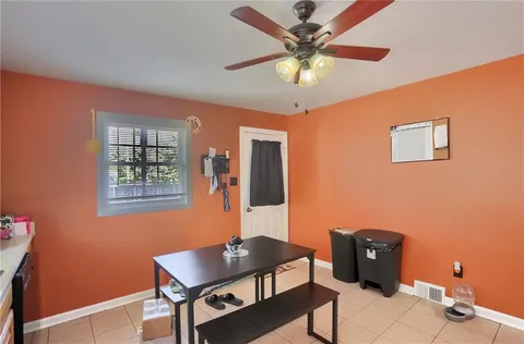 a workspace with furniture and window