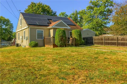 a front view of house with yard