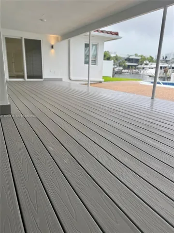a view of swimming pool with outdoor seating
