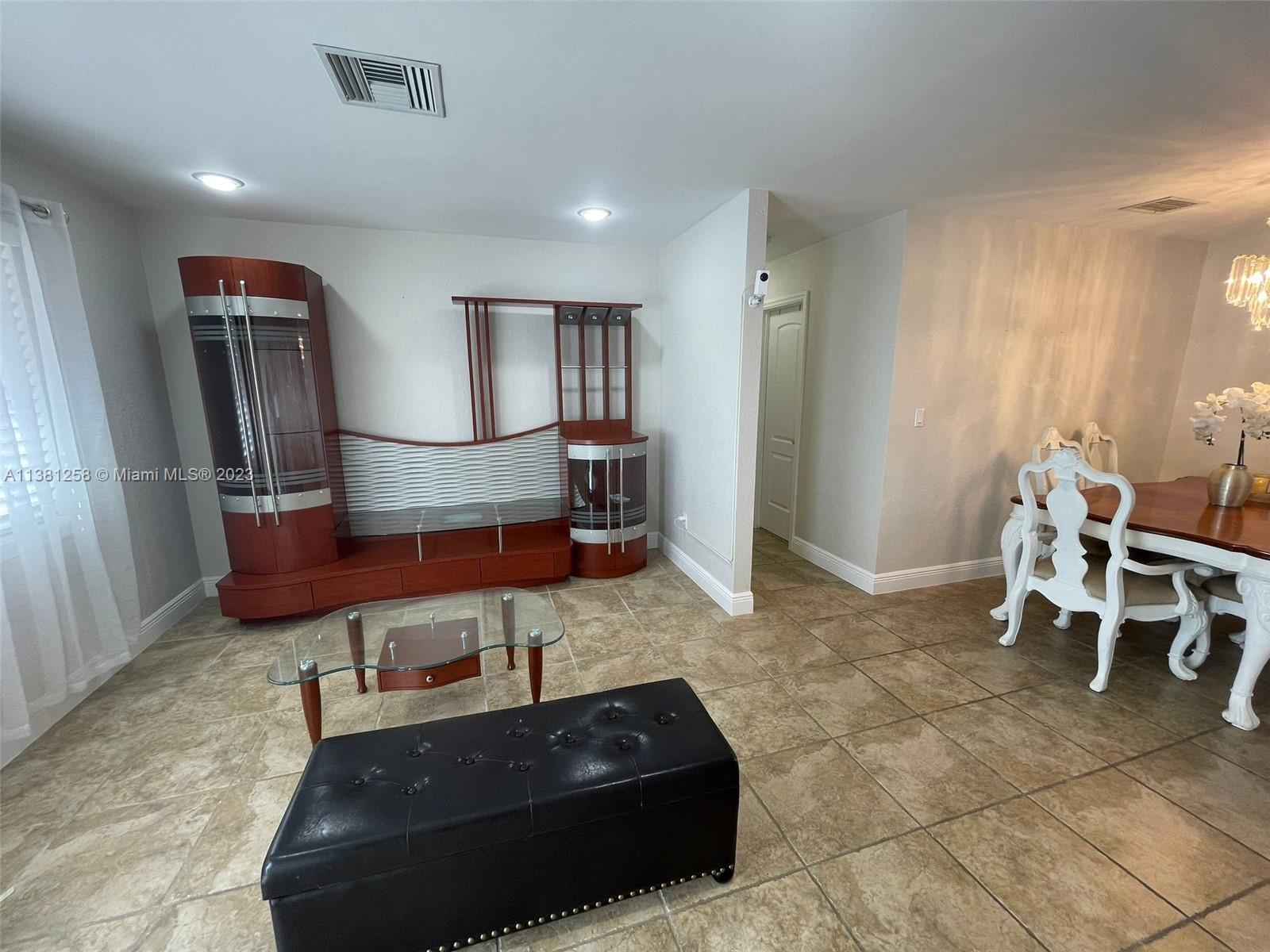 25305 Southwest 124th Court Homestead, FL 33032 - Photo 11 of 39 a living room with furniture