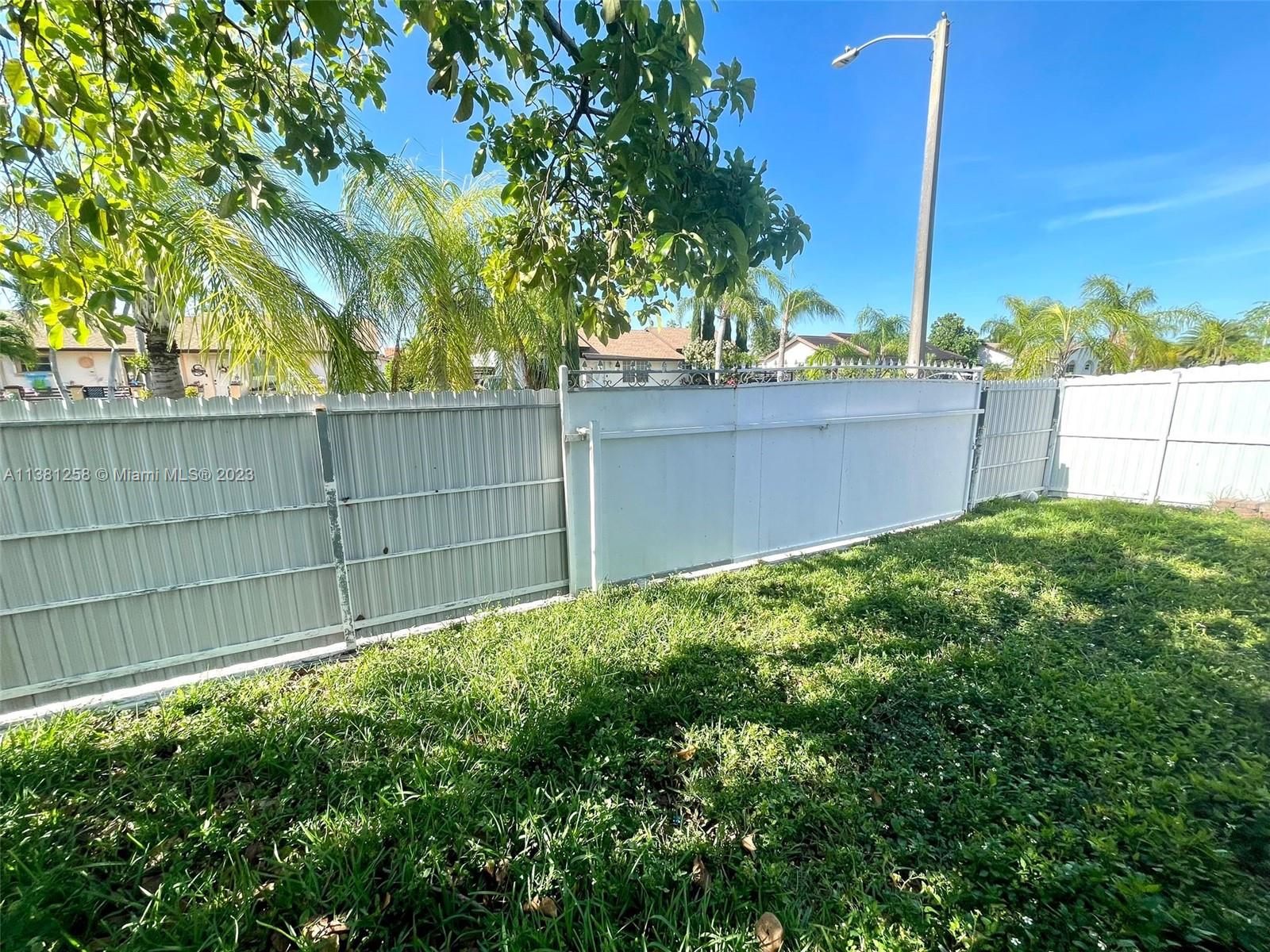 25305 Southwest 124th Court Homestead, FL 33032 - Photo 37 of 39 a view of a backyard