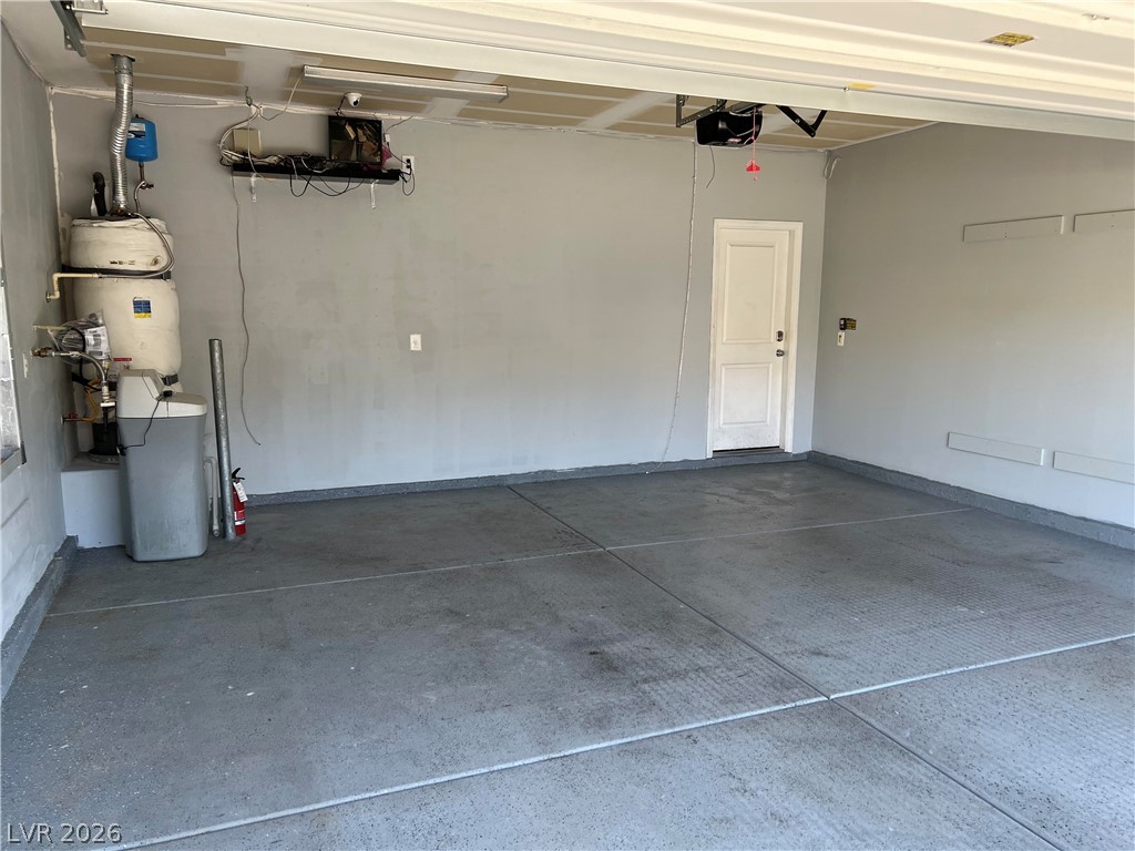 9325 Keystone Ridge Avenue Las Vegas, NV 89148 - Photo 2 of 17 Secure parking solutions are offered in this well-maintained garage.