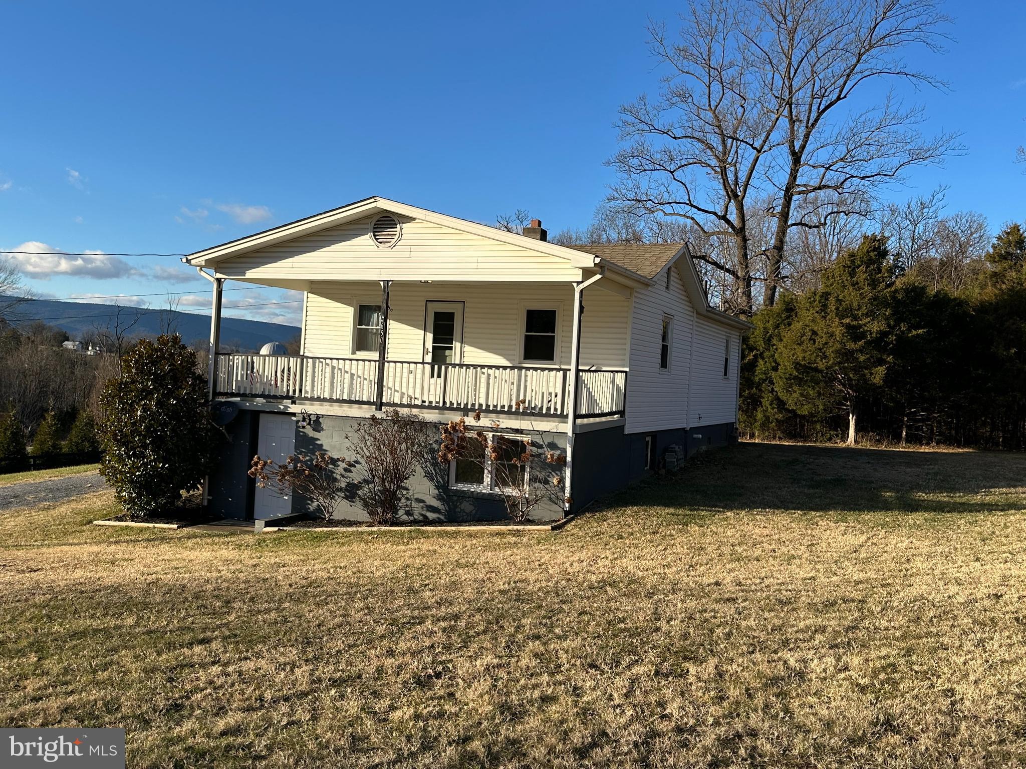 650 Honeyville Road Stanley, VA 22851 - Photo 1 of 27 a front view of a house with a yard