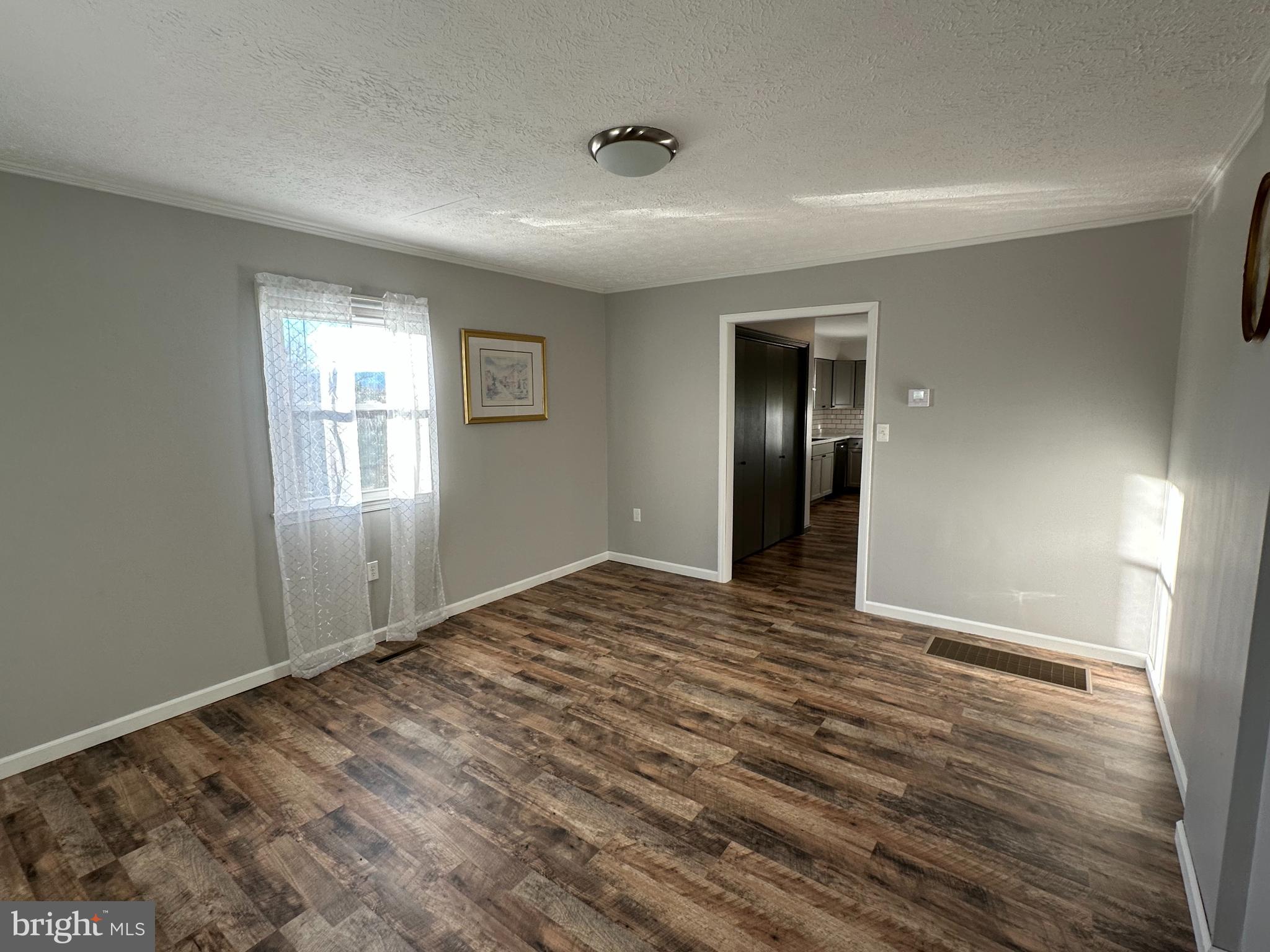 650 Honeyville Road Stanley, VA 22851 - Photo 11 of 27 a view of an empty room and window