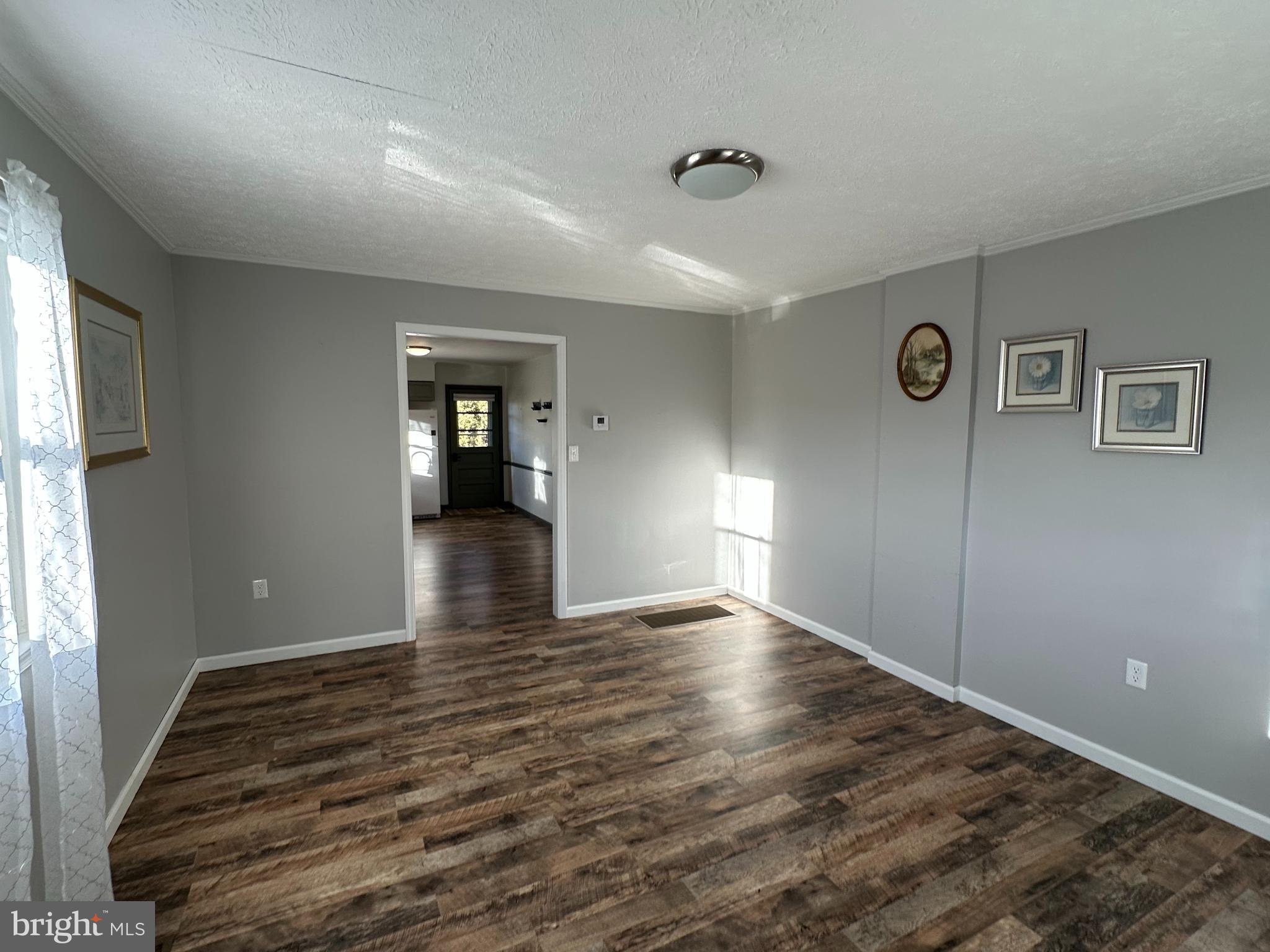 650 Honeyville Road Stanley, VA 22851 - Photo 12 of 27 a view of a livingroom with wooden floor