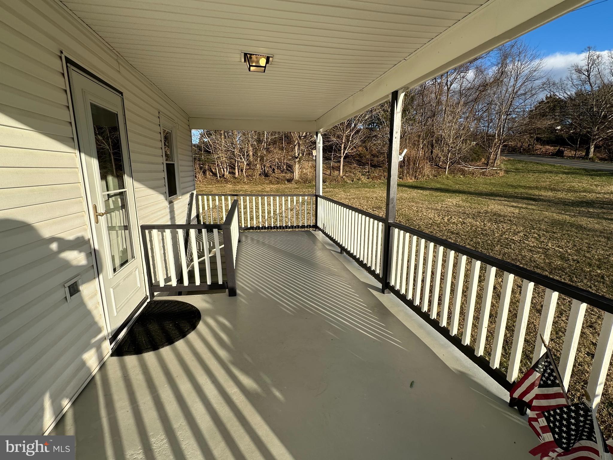 650 Honeyville Road Stanley, VA 22851 - Photo 14 of 27 a view of a porch with wooden floor