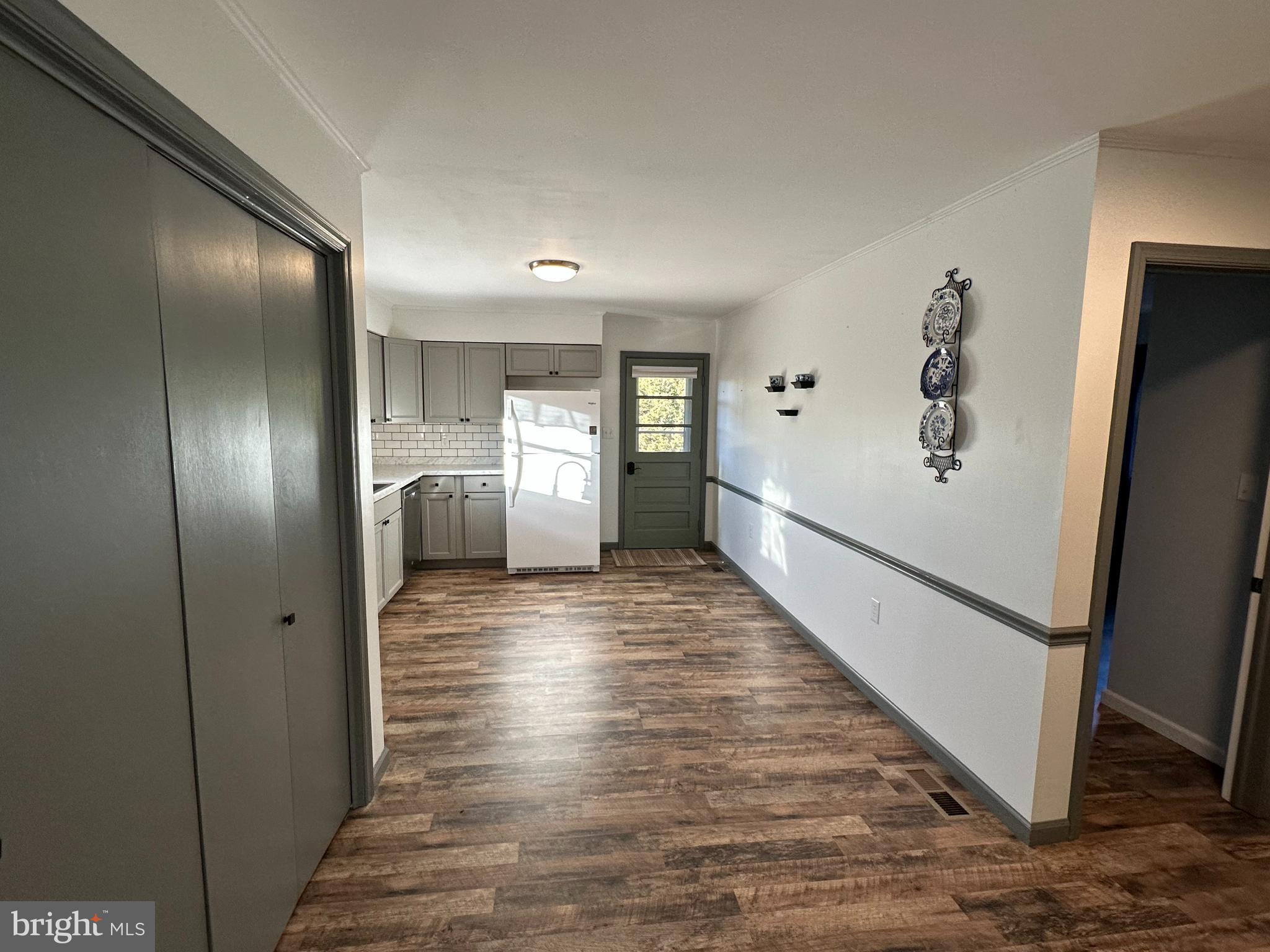 650 Honeyville Road Stanley, VA 22851 - Photo 15 of 27 a view of a hallway with wooden floor windows and stairs