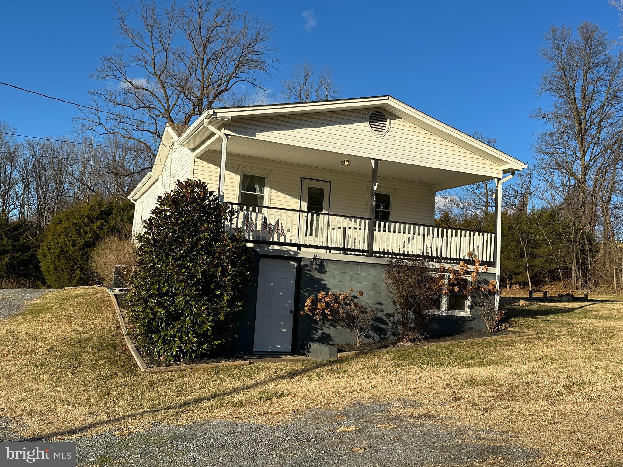650 Honeyville Road Stanley, VA 22851 - Photo 2 of 27 a front view of a house with a yard