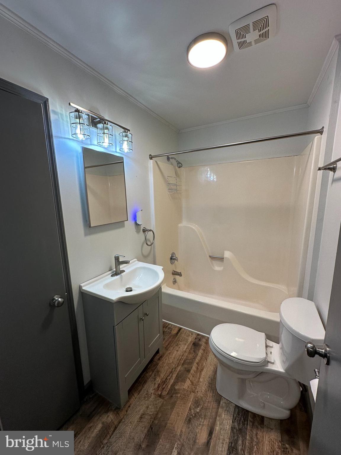 650 Honeyville Road Stanley, VA 22851 - Photo 21 of 27 a bathroom with a sink toilet mirror and bathtub