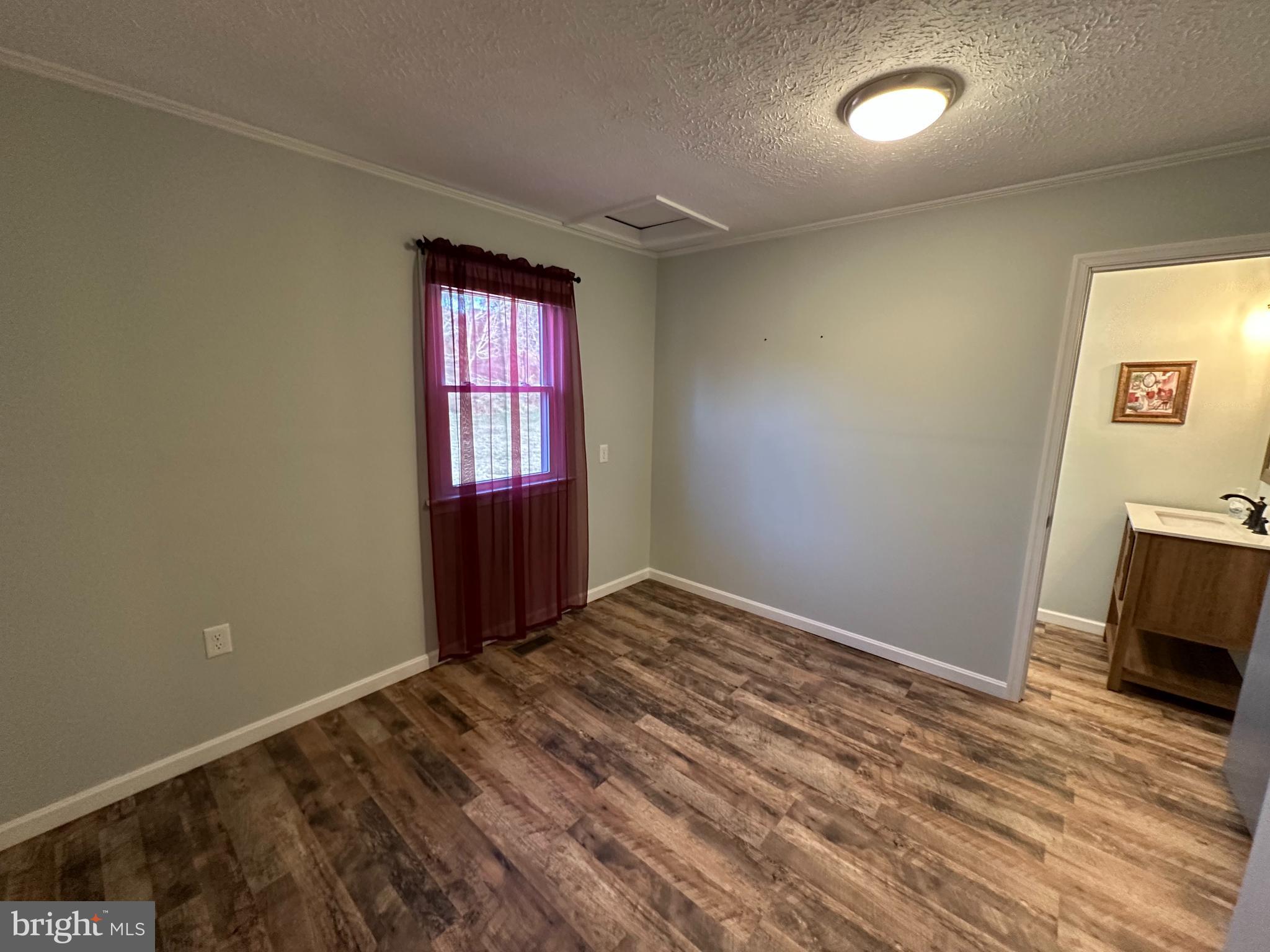 650 Honeyville Road Stanley, VA 22851 - Photo 23 of 27 a view of an empty room and window