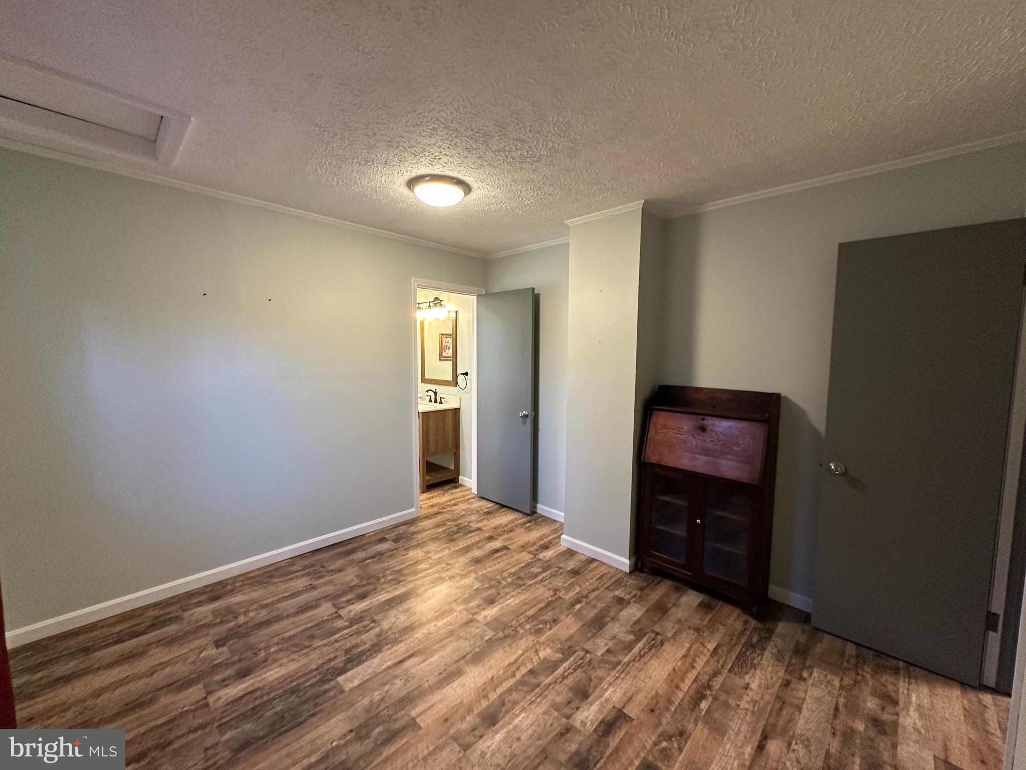 650 Honeyville Road Stanley, VA 22851 - Photo 24 of 27 a view of empty room with wooden floor