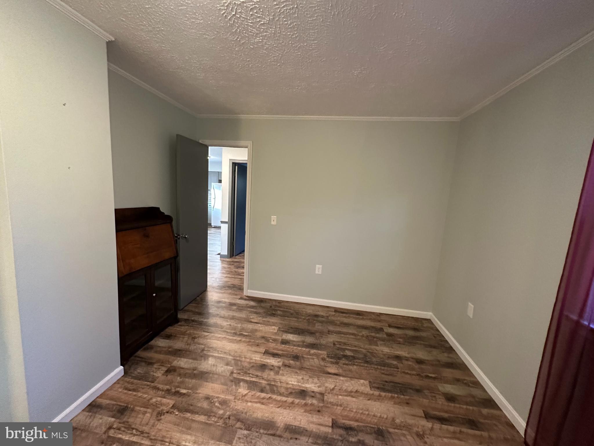 650 Honeyville Road Stanley, VA 22851 - Photo 25 of 27 a view of an empty room and wooden floor