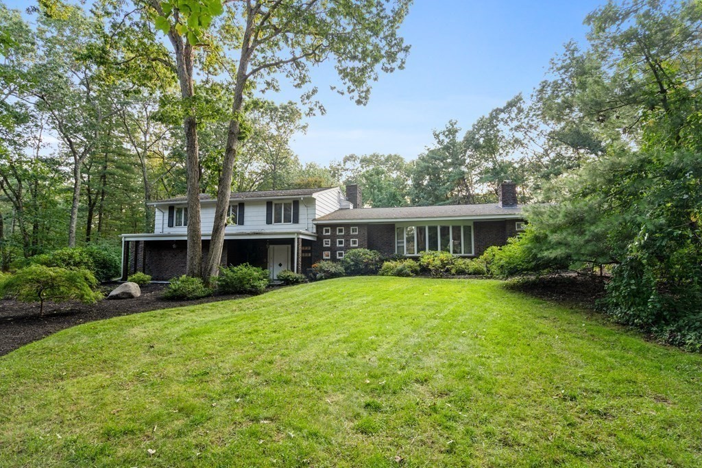 7 Sheridan Road Andover, MA 01810 - Photo 1 of 38 a front view of house with yard and green space