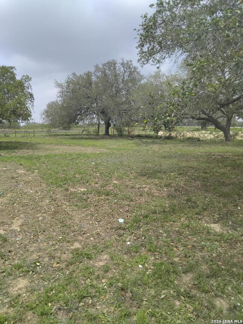 82 Lance Lane Poteet, TX 78065 - Photo 4 of 5 a view of a field with trees