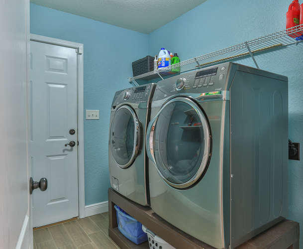 224 Shipwreck Road Santa Rosa Beach, FL 32459 - Photo 15 of 38 a utility room with dryer and washer