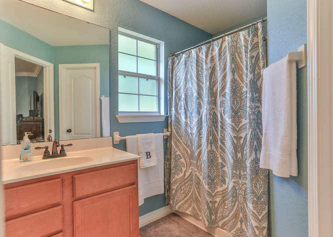 224 Shipwreck Road Santa Rosa Beach, FL 32459 - Photo 24 of 38 a bathroom with a sink and a mirror