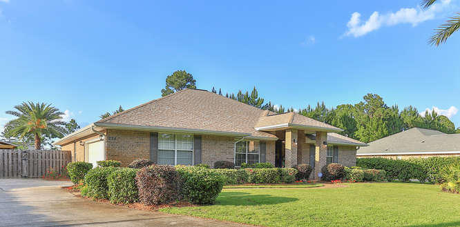 224 Shipwreck Road Santa Rosa Beach, FL 32459 - Photo 3 of 38 a front view of a house with garden