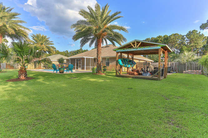 224 Shipwreck Road Santa Rosa Beach, FL 32459 - Photo 32 of 38 a view of a house with a big yard