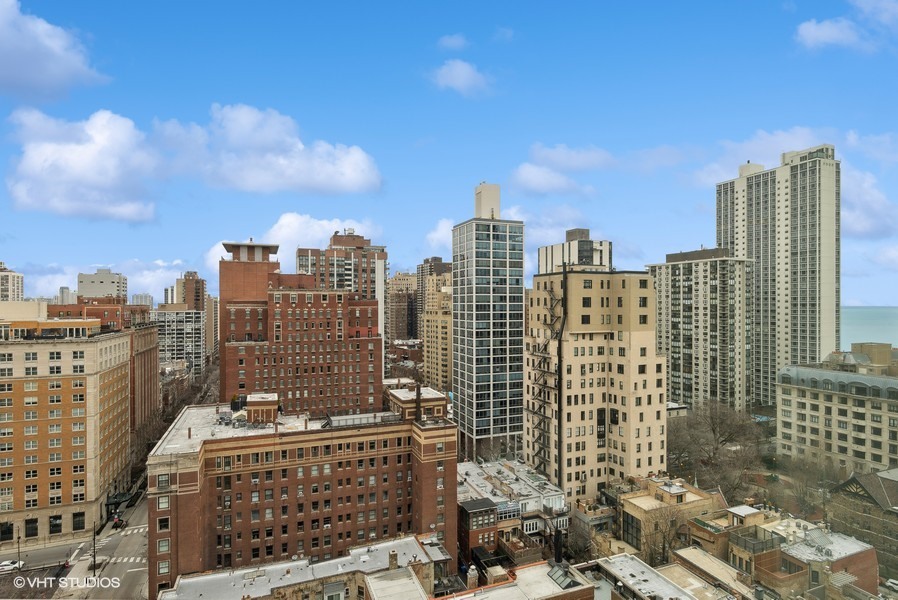 1 East Scott Street, Unit 2011 Chicago, IL 60610 - Photo 12 of 13 a view of a city with tall buildings