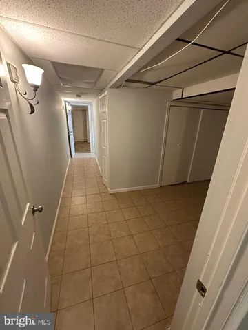 a bathroom with a toilet sink and shower