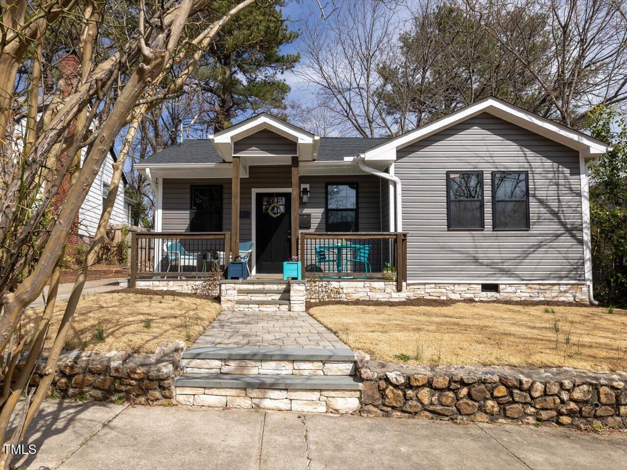 611 Dunbar Street Durham, NC 27701 - Photo 1 of 28 a view of a house with yard and balcony