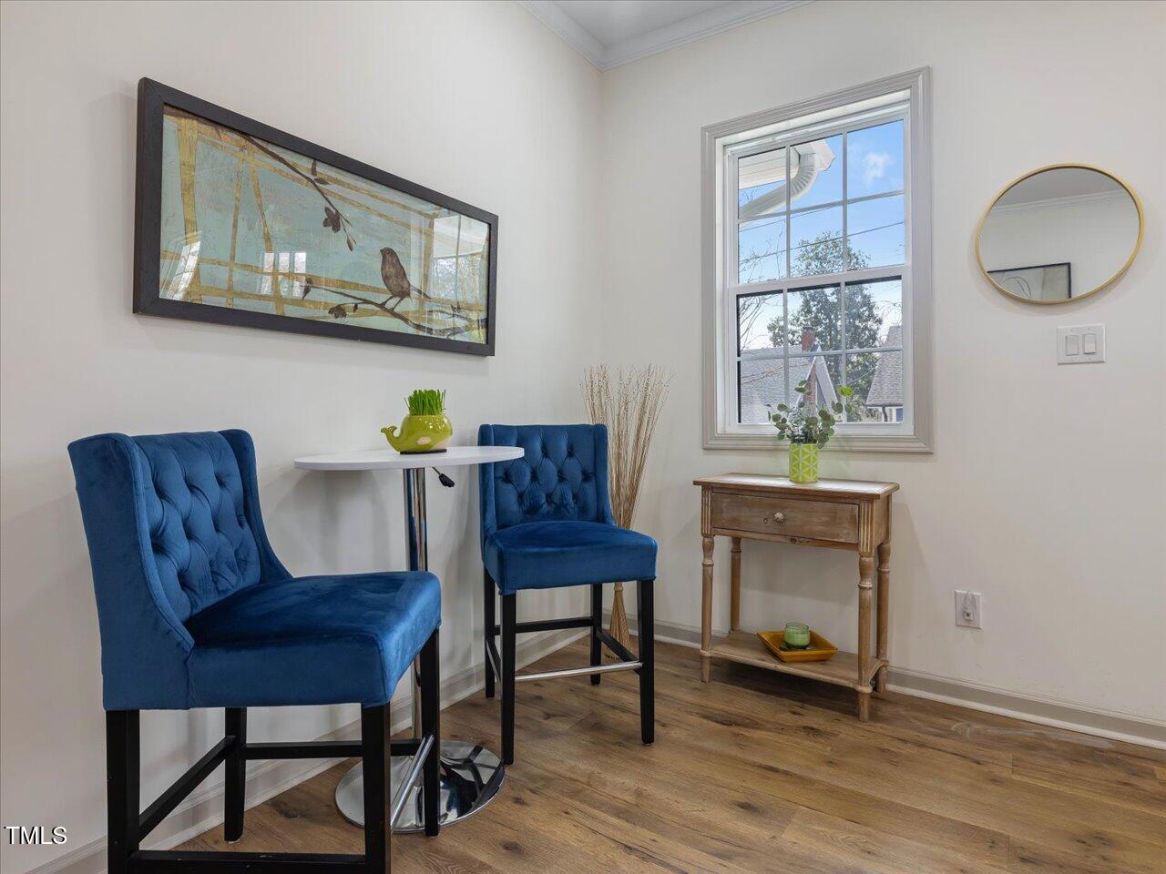 611 Dunbar Street Durham, NC 27701 - Photo 11 of 28 a view of a workspace with furniture and a window