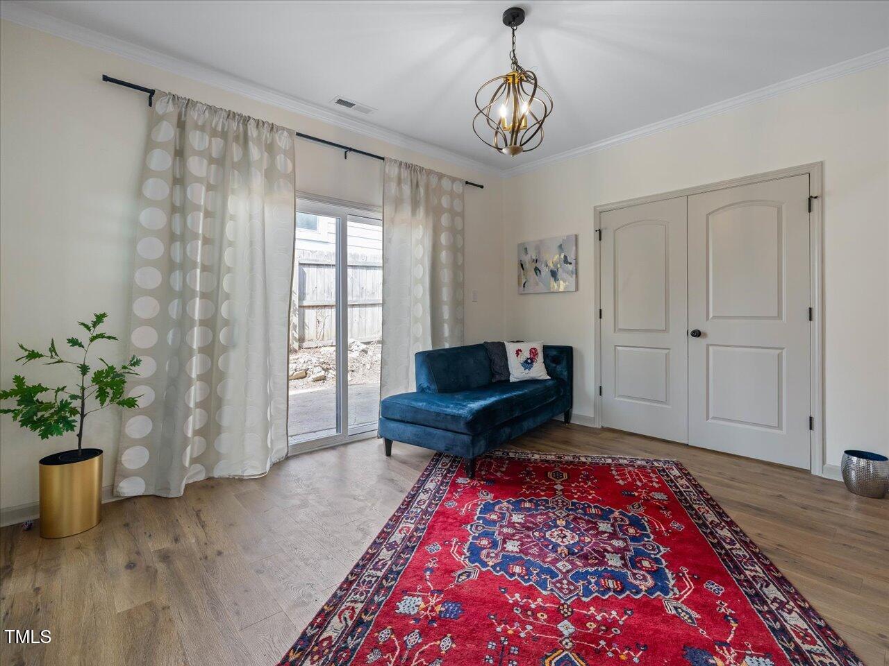 611 Dunbar Street Durham, NC 27701 - Photo 7 of 28 a living room with furniture and a potted plant