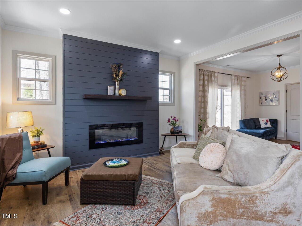 611 Dunbar Street Durham, NC 27701 - Photo 8 of 28 a living room with furniture and a fireplace