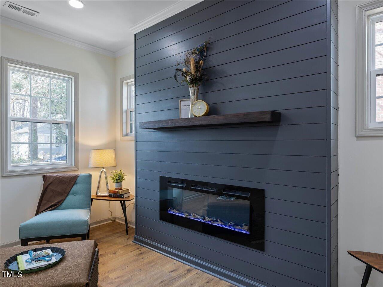 611 Dunbar Street Durham, NC 27701 - Photo 9 of 28 a living room with furniture and a fireplace