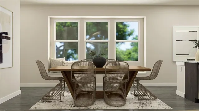 a view of a dining room with furniture window and outside view