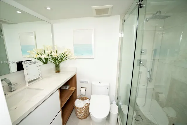 a bedroom with a bed and closet