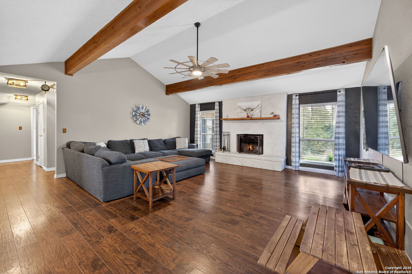 5 Cedar Ridge Road Boerne, TX 78006 - Photo 11 of 47 a living room with furniture fireplace and flat screen tv
